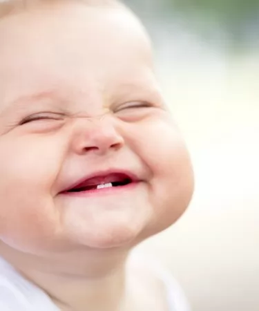 Прорізування зубів симптоми у дітей